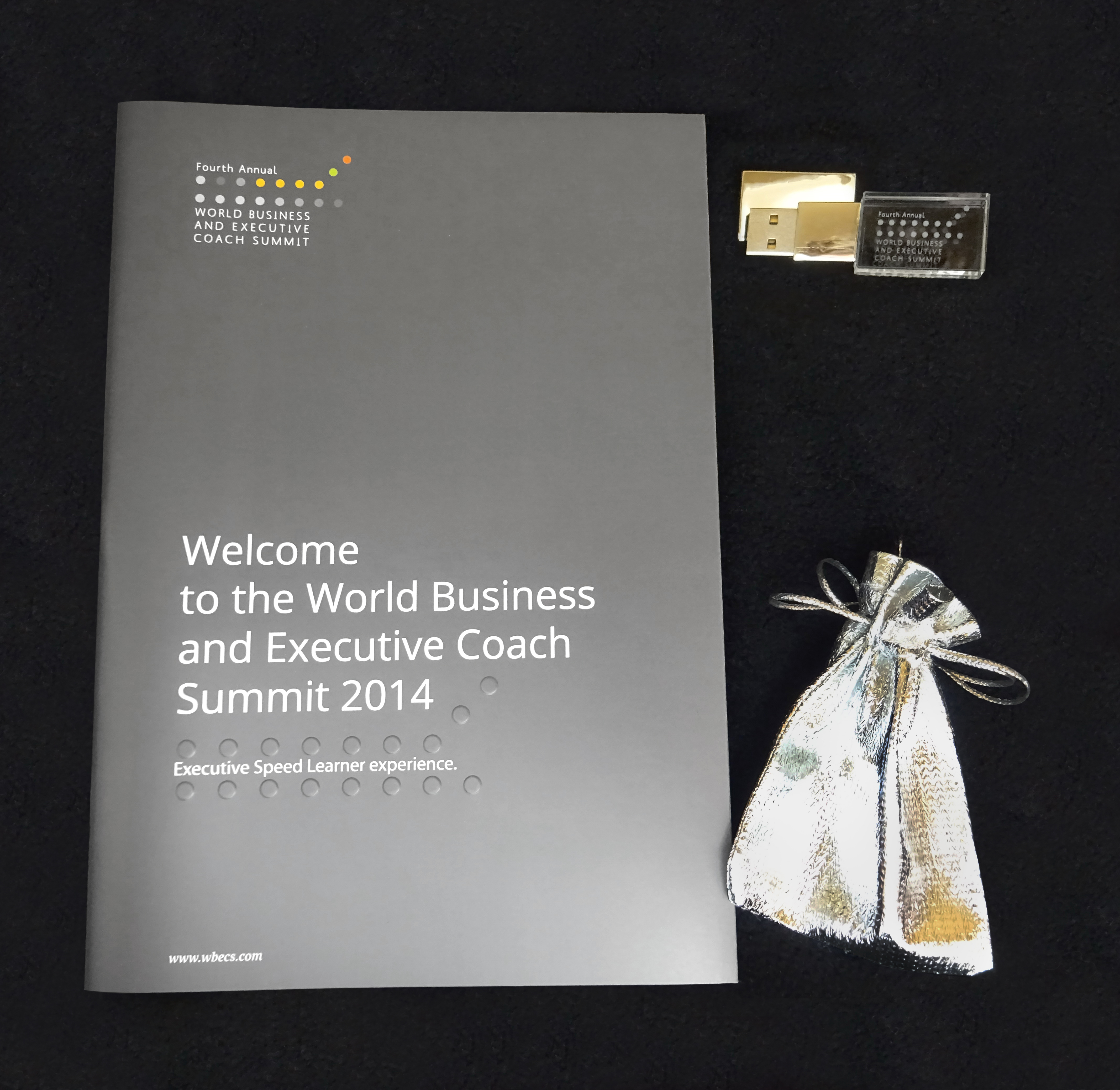 WBECS presenter conference guide and laser-engraved USB drive